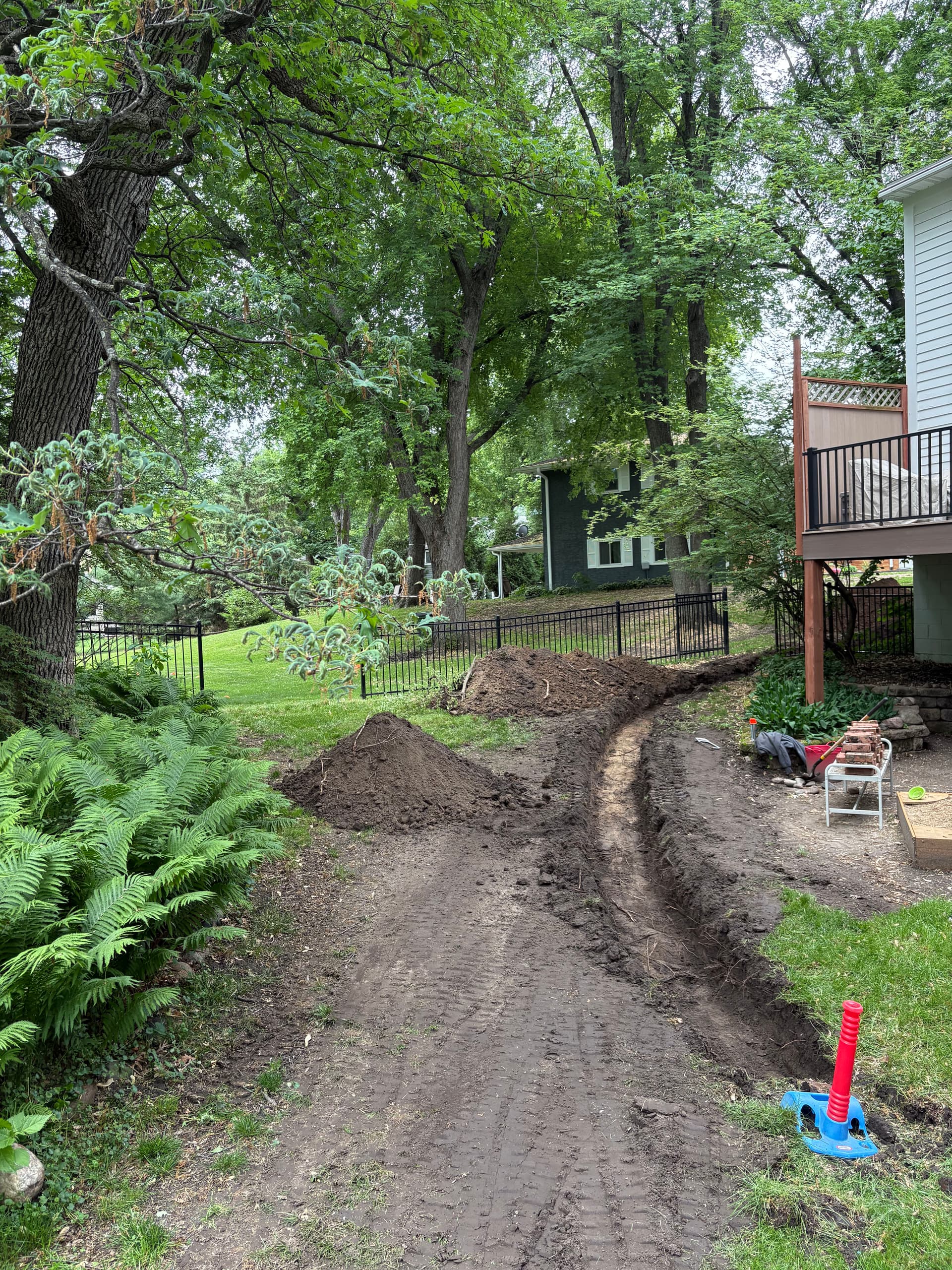 French Drain Installation with Gravel and Hydroseeding Finish