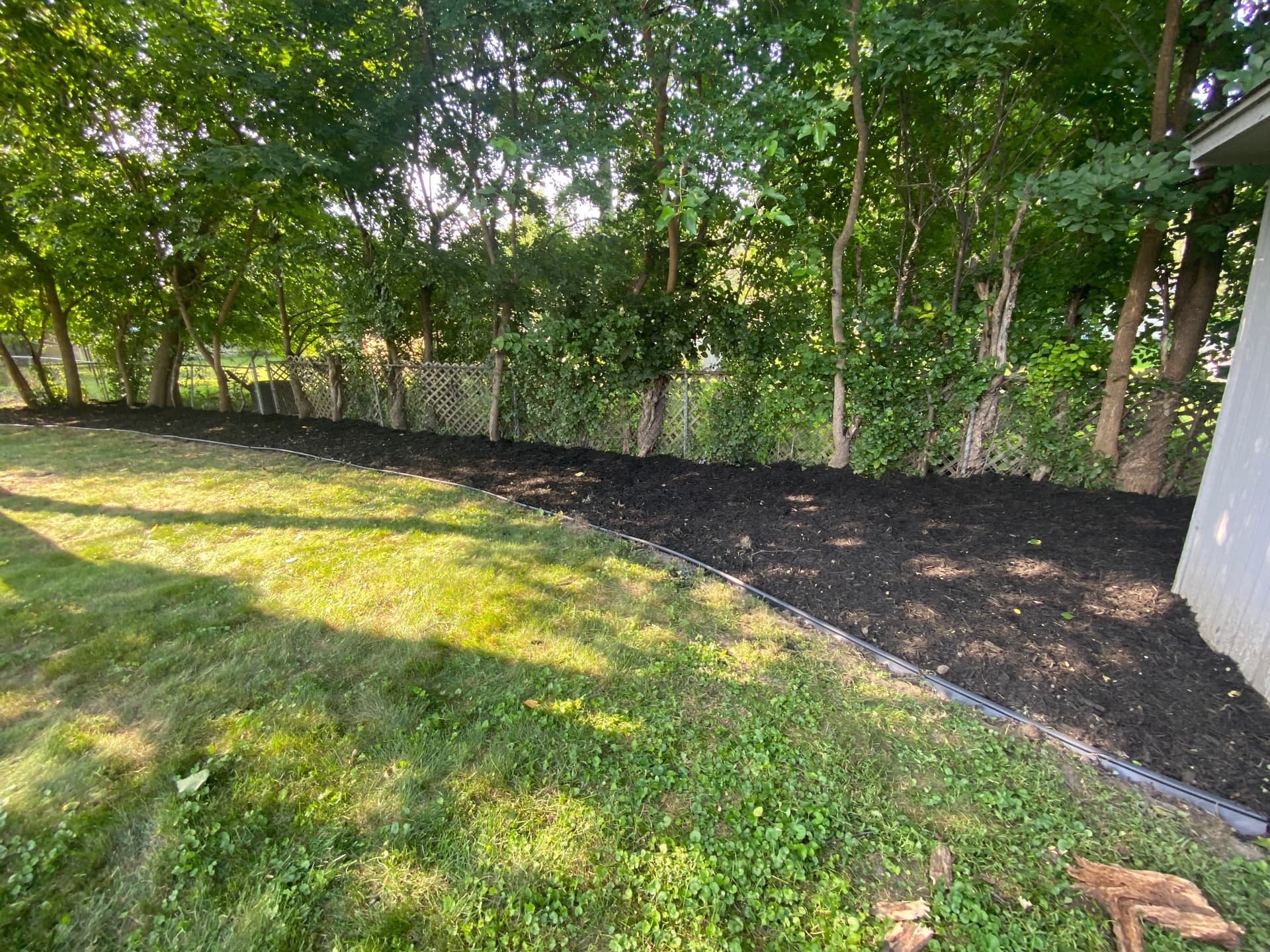 Gallery photos for Revamp Your Outdoor Spaces with Our Lawn Care and Mulch Installation: Image #1