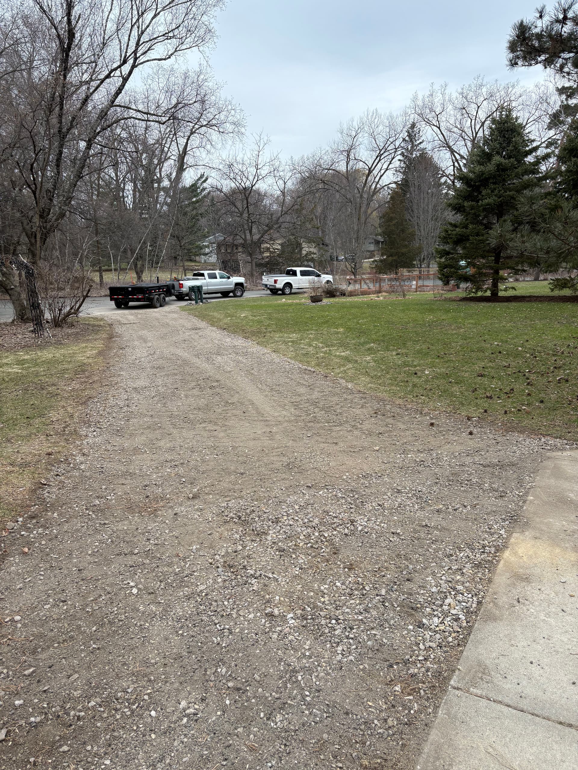 Gravel Driveway Regrade and Hardwood Mulch Path Install image