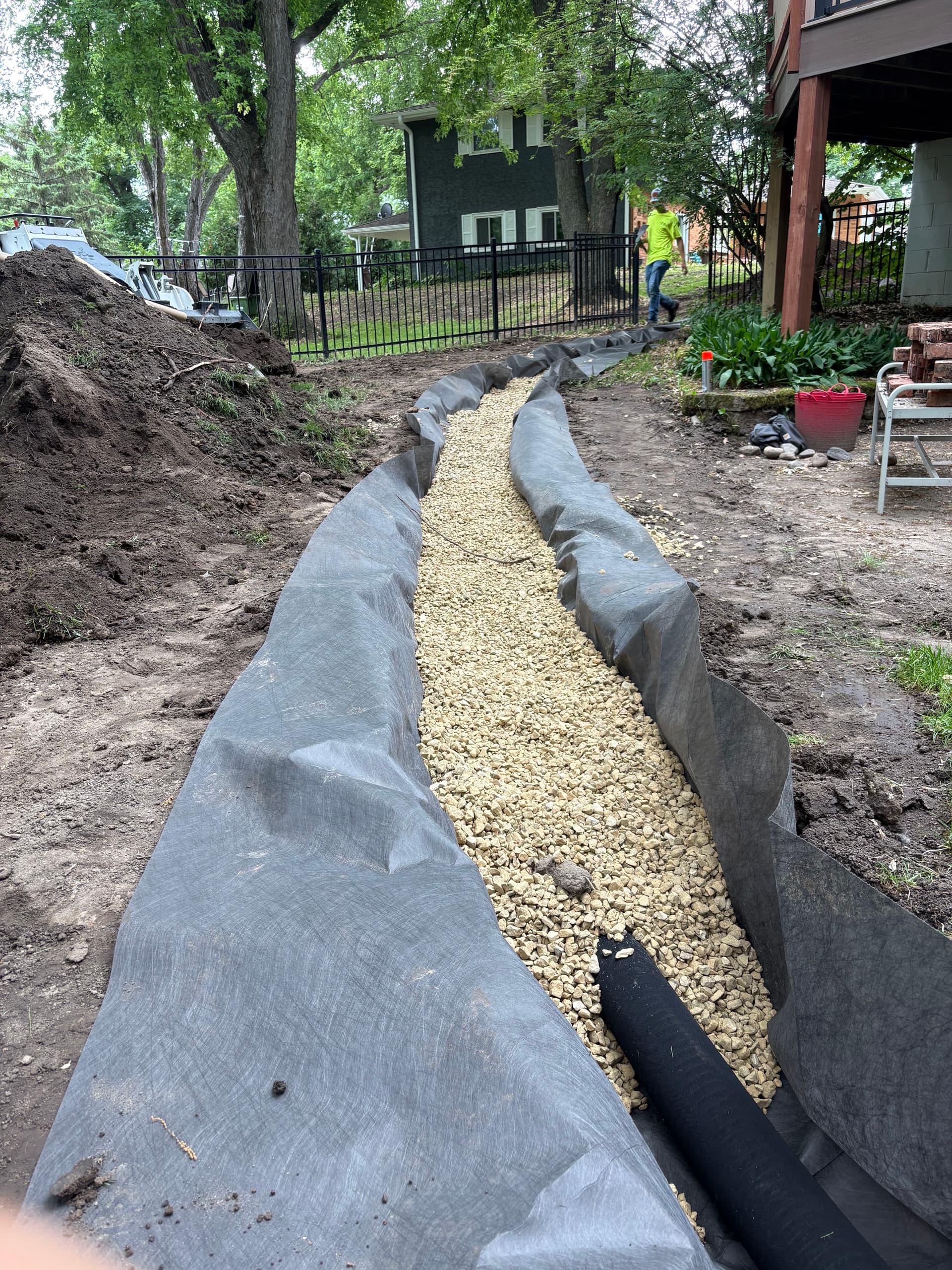 French Drain Installation with Gravel and Hydroseeding Finish