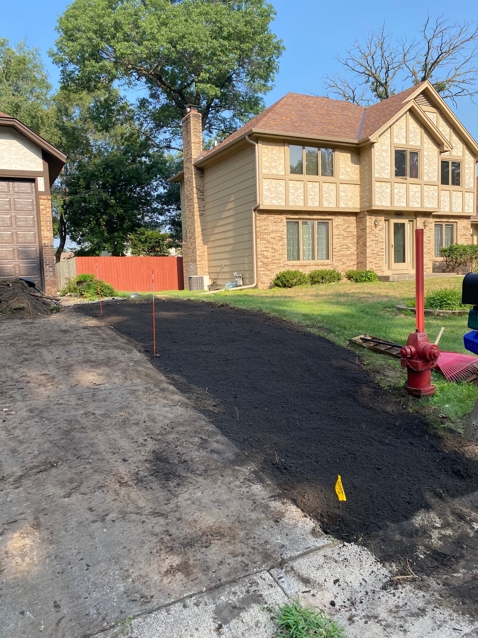 From Bare Dirt to Green Lawn with Fresh Sod Installation image