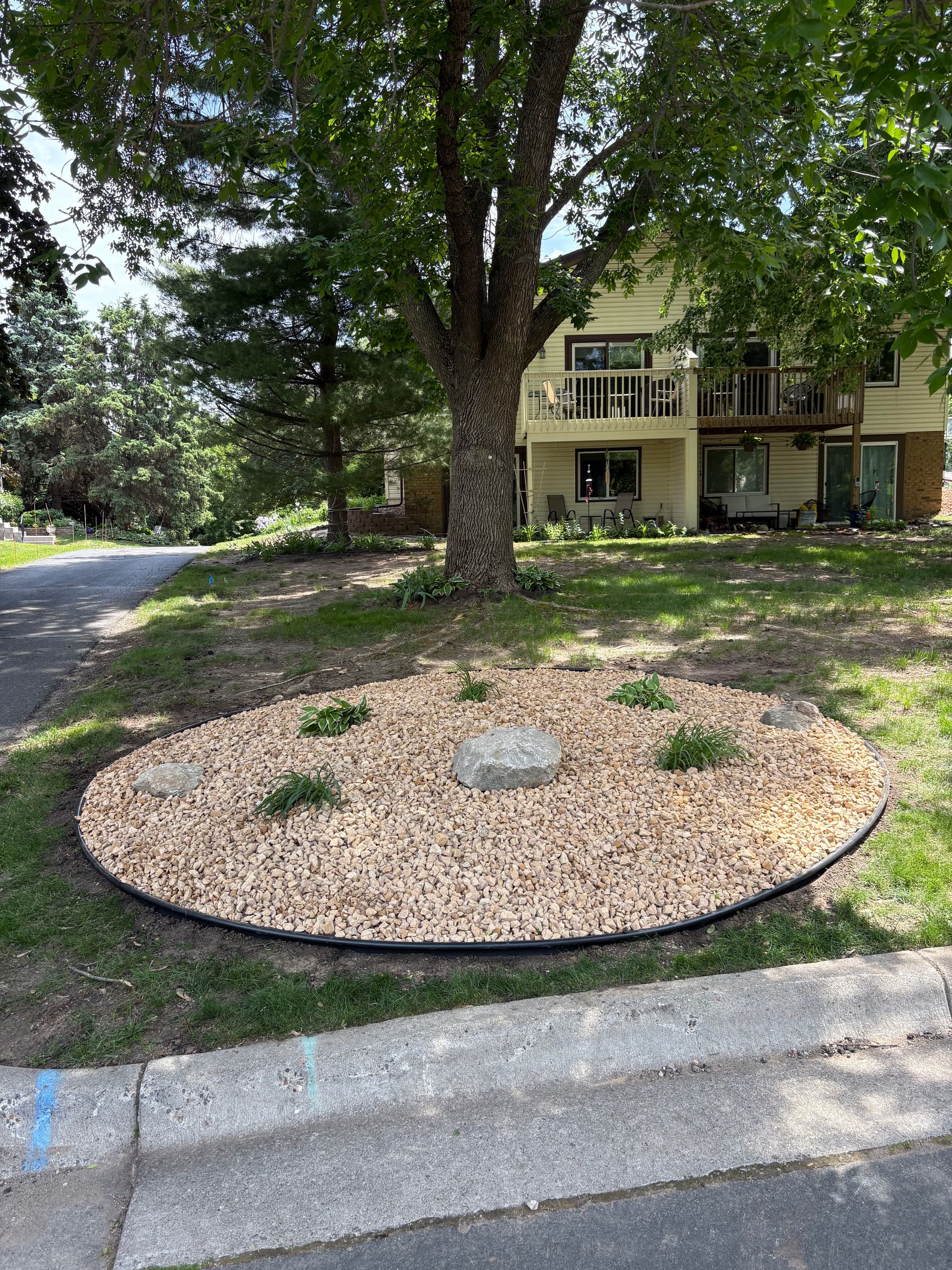 Gallery photos for Rock Bed Installation That Cleans Up a Front Yard Fast: Image #1